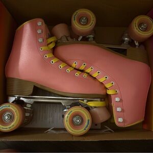 Pink Roller Skates with Yellow Laces